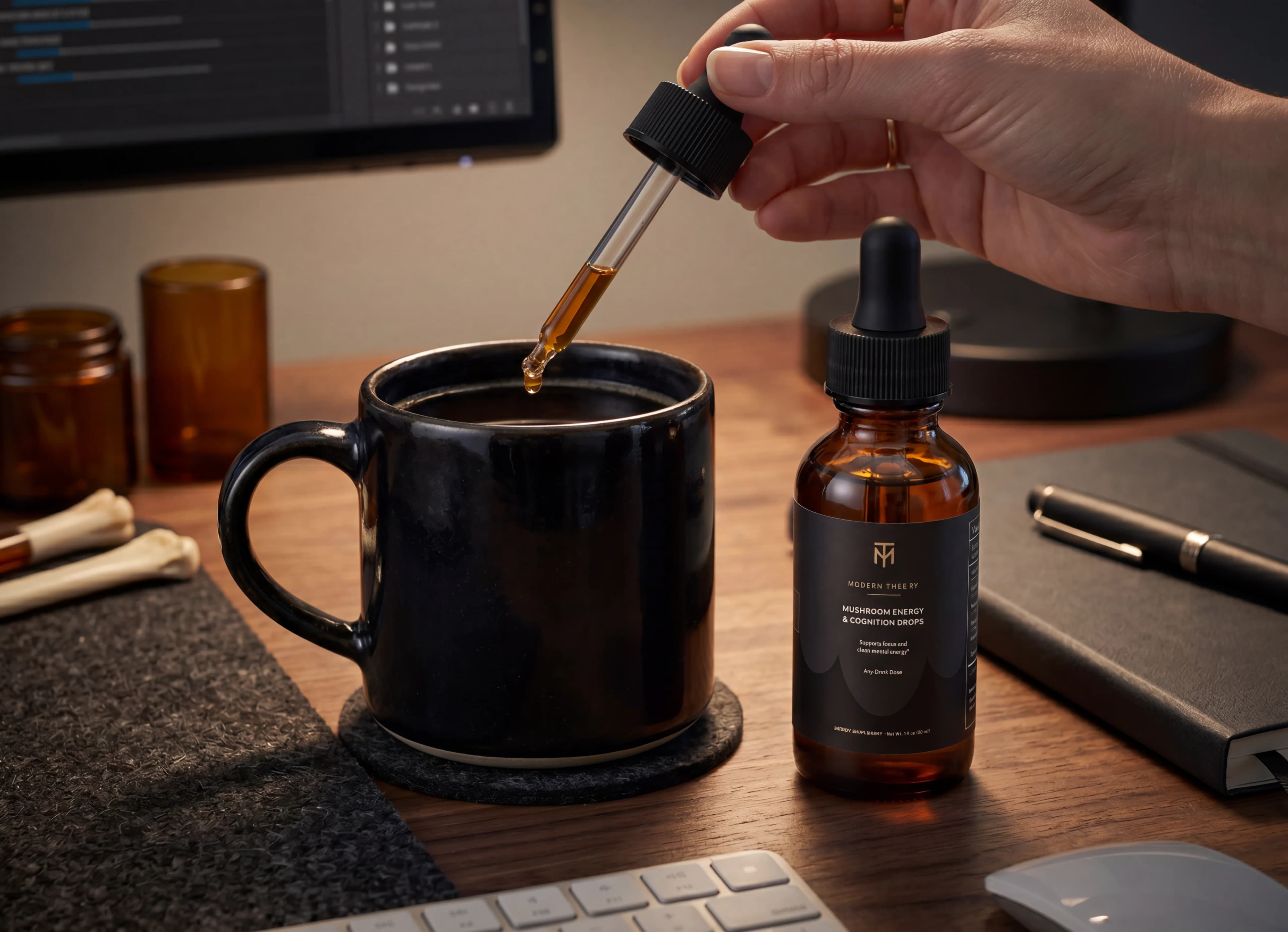 Modern Theory dropper being added to a coffee at a work desk