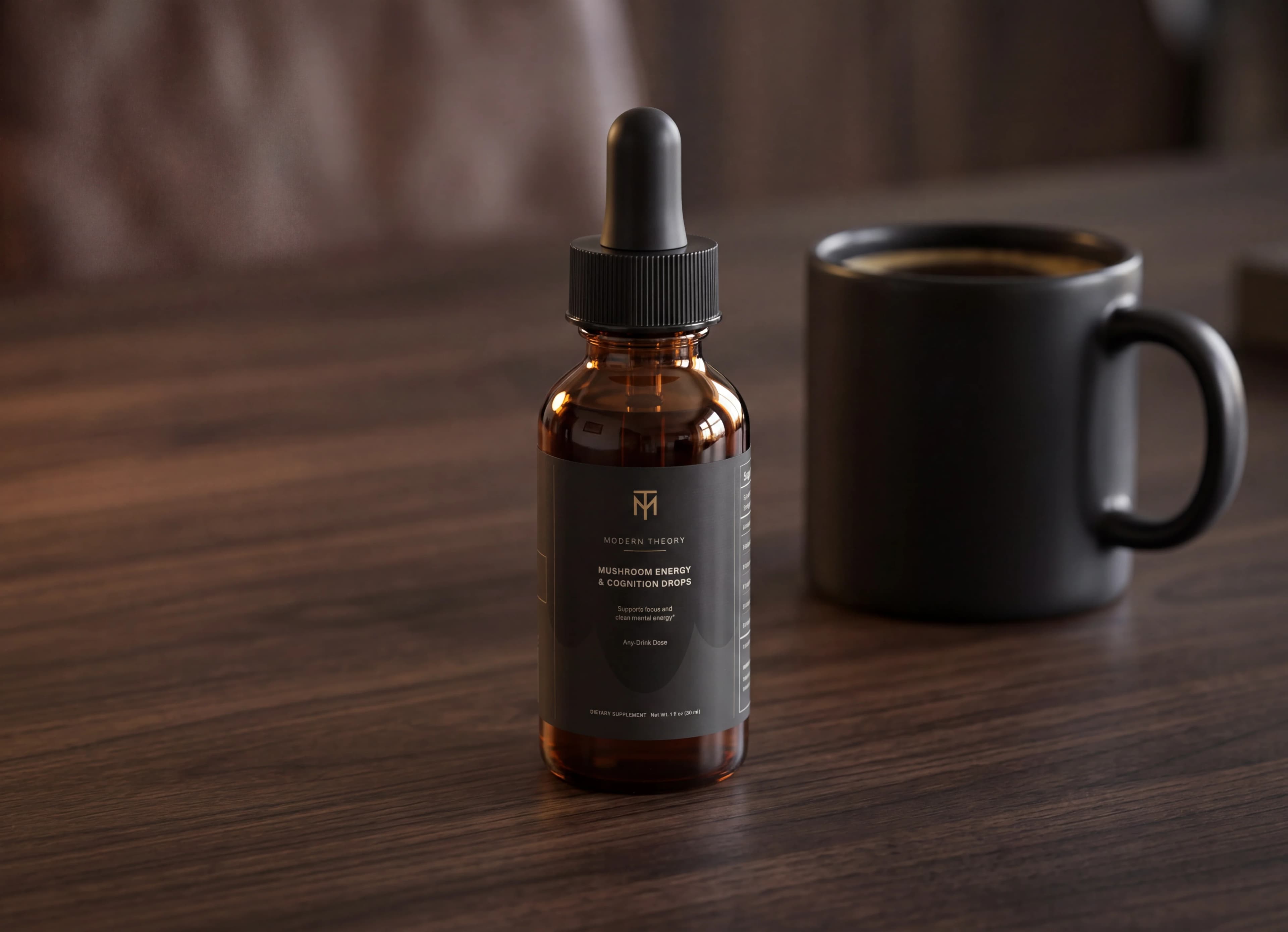 Modern Theory bottle beside a coffee on a dark wooden desk